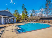 Thumbnail 14 of 15 - Pool area at Piedmont Park Apartments, Mississippi, 39401