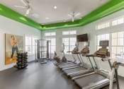 Thumbnail 11 of 25 - Cardio Machines In Gym at Century Avenues Apartments, Florida, 33813