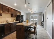 Thumbnail 6 of 26 - Open Concept Kitchen and Living