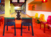 Thumbnail 14 of 38 - Bowling alley with tables and chairs