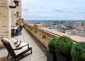 Thumbnail 11 of 38 - Apartments for Rent in Newark NJ-Eleven80 Apartments Rooftop Terrace With Seating And Planters And City Views