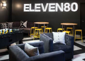 Thumbnail 21 of 38 - Large gaming lounge with foosball table