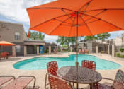 Thumbnail 16 of 25 - Poolside Dining Tables at Ranchwood Apartments, Arizona