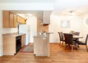 Thumbnail 8 of 25 - Dining Room and Kitchen View at Ranchwood Apartments, Glendale, 85301