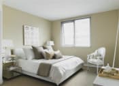 Thumbnail 3 of 33 - Bedroom with queen size bed in apartment building in los angeles at Wilshire Vermont, Los Angeles