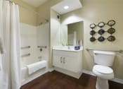 Thumbnail 12 of 33 - Bathroom with sink and bath at Wilshire Vermont, 90010