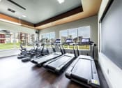Thumbnail 16 of 39 - Fitness Center  Treadmills & Bikes at Legacy Creekside Apartments, San Antonio, Texas