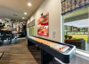 Thumbnail 7 of 39 - Shuffleboard Table at Legacy Creekside Apartments, San Antonio