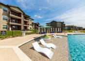 Thumbnail 3 of 39 - Resort Style Pool with Cabanas & Pool Loungers at Legacy Creekside Apartments, Texas, 78251