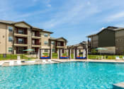 Thumbnail 2 of 39 - Luxurious Swimming Pool at Legacy Creekside Apartments, San Antonio, TX