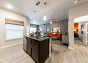Thumbnail 34 of 39 - Open Kitchen to Living Room at Legacy Creekside Apartments, San Antonio, 78251