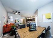 Thumbnail 35 of 39 - Dining Nook with Living Room off the Kitchen at Legacy Creekside Apartments, San Antonio, Texas