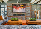 Thumbnail 51 of 70 - Couch and table with tv at JTB Apartments, Florida, 32256