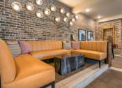 Thumbnail 55 of 70 - Resident Lounge area couch at JTB Apartments, Florida