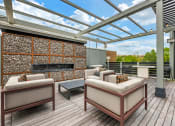 Thumbnail 36 of 70 - Rooftop fireplace at JTB Apartments, Florida