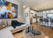 Thumbnail 6 of 70 - Living room couch and table at JTB Apartments, Jacksonville, Florida