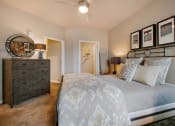 Thumbnail 13 of 70 - Large Bedrooms with cozy bed and lamp at JTB Apartments, Jacksonville, Florida