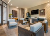 Thumbnail 61 of 70 - Clubhouse interior with seating area at lounge at JTB Apartments, Jacksonville