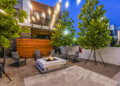 Thumbnail 39 of 70 - Living area outdoor at night at JTB Apartments, Jacksonville, FL