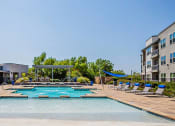 Thumbnail 24 of 27 - Outdoor Swimming Pool at The Landings at Brooks City-Base, Texas