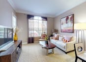 Thumbnail 13 of 28 - Luxury apartments with spacious living room and 10-foot ceilings at Tuscany Court Apartments in Houston.