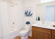 Thumbnail 1 of 36 - Bathroom with single vanity and bath tub/shower