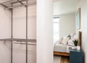 Thumbnail 3 of 36 - Alfa closet shelving in walk-in closet