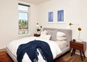 Thumbnail 5 of 36 - Bedroom with queen bed and window
