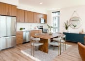 Thumbnail 29 of 36 - Kitchen with stainless steel refrigerator, dining table, and window