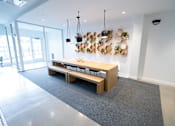 Thumbnail 31 of 47 - This is an alternate view of the conference table in the main lobby  at Grand Flats, St. Louis, MO, 63104