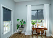 Thumbnail 11 of 47 - This is the living room view to the outside balcony  at Grand Flats, St. Louis, 63104