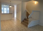Thumbnail 11 of 18 - home living area and stairs at Preserve at Boynton Beach, Boynton Beach, Florida
