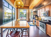 Thumbnail 8 of 13 - Community room kitchen area