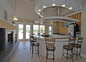 Thumbnail 14 of 18 - entertainment and social space inside Harbour Breeze Apartment community