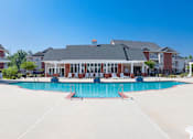 Thumbnail 1 of 29 - outdoor sun deck and pool behind the clubhouse