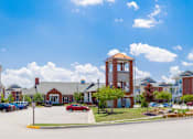 Thumbnail 10 of 29 - main entrance to 1200 Acqua Apartment Homes in Petersburg, VA