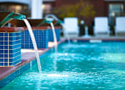 Thumbnail 27 of 29 - water features pour into the pool at 1200 Acqua