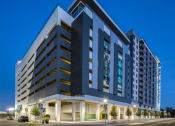 Thumbnail 18 of 19 - Building Exterior In Night at The Julian Orlando, Orlando, 32801