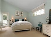 Thumbnail 4 of 14 - bedroom with bed and blue pillows