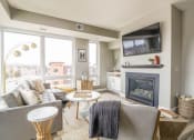 Thumbnail 8 of 61 - Living Room With Fireplace at Vue at Bluestone, Duluth, 55803