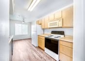Thumbnail 2 of 23 - The Barton Apartments Two Bedroom Kitchen