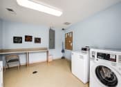 Thumbnail 13 of 24 - Laundry room