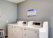 Thumbnail 23 of 27 - Laundry room