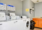 Thumbnail 22 of 27 - Laundry room