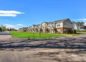 Thumbnail 24 of 31 - Newly-built section of Muskego School Apartments with large green lawns
