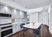 Thumbnail 4 of 30 - Kitchen with cabinets at The Glover House, Washington, Washington
