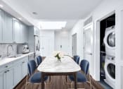 Thumbnail 9 of 30 - Kitchen with cabinets and appliances at The Glover House, Washington