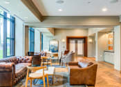 Thumbnail 20 of 30 - Resident lounge with couch at The Glover House, Washington