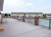 Thumbnail 3 of 32 - The Club deck with patio furniture