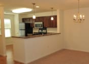 Thumbnail 7 of 32 - breakfast bar area into dining room